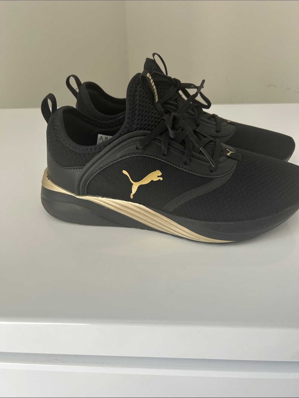 Puma Black with Gold Accent Athletic Sneakers